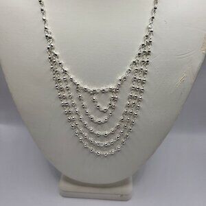 Sevilla sterling silver necklace, beautiful in person.  Mirror effect.